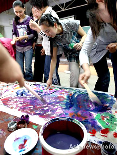 Students paint out college exam pressure
