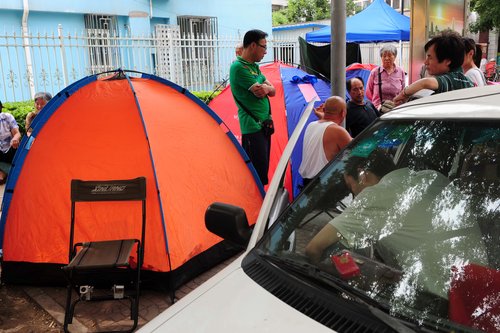 Parents camp out for 8 days outside kindergarten