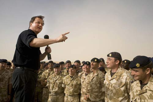 UK's Cameron says troops will leave once Afghans ready