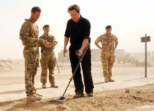 UK's Cameron says troops will leave once Afghans ready