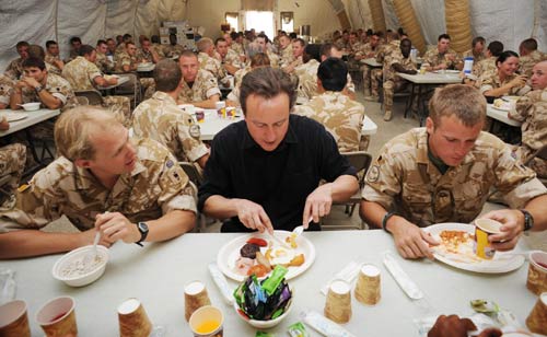 UK's Cameron says troops will leave once Afghans ready