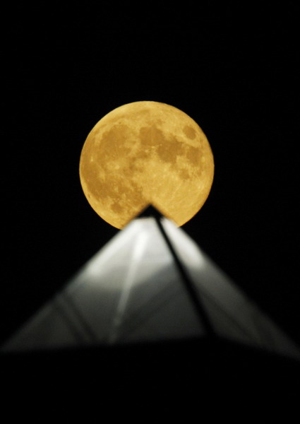 Moon above pyramid at the Glastonbury Festival 2010
