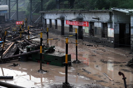Coal mine flood traps 9, eight confirmed alive