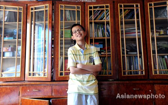 Boy, 12, sets a record in college entrance exam