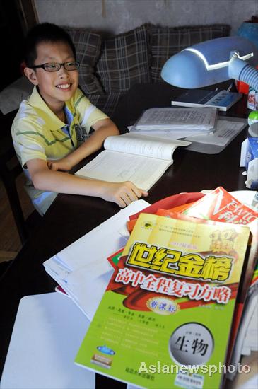 Boy, 12, sets a record in college entrance exam