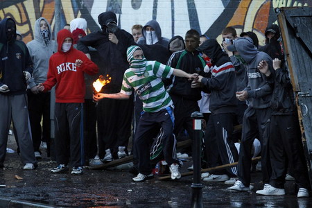 Belfast police, Catholic rioters clash over parade