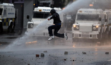 Belfast police, Catholic rioters clash over parade