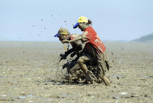 Competitors get all muddy