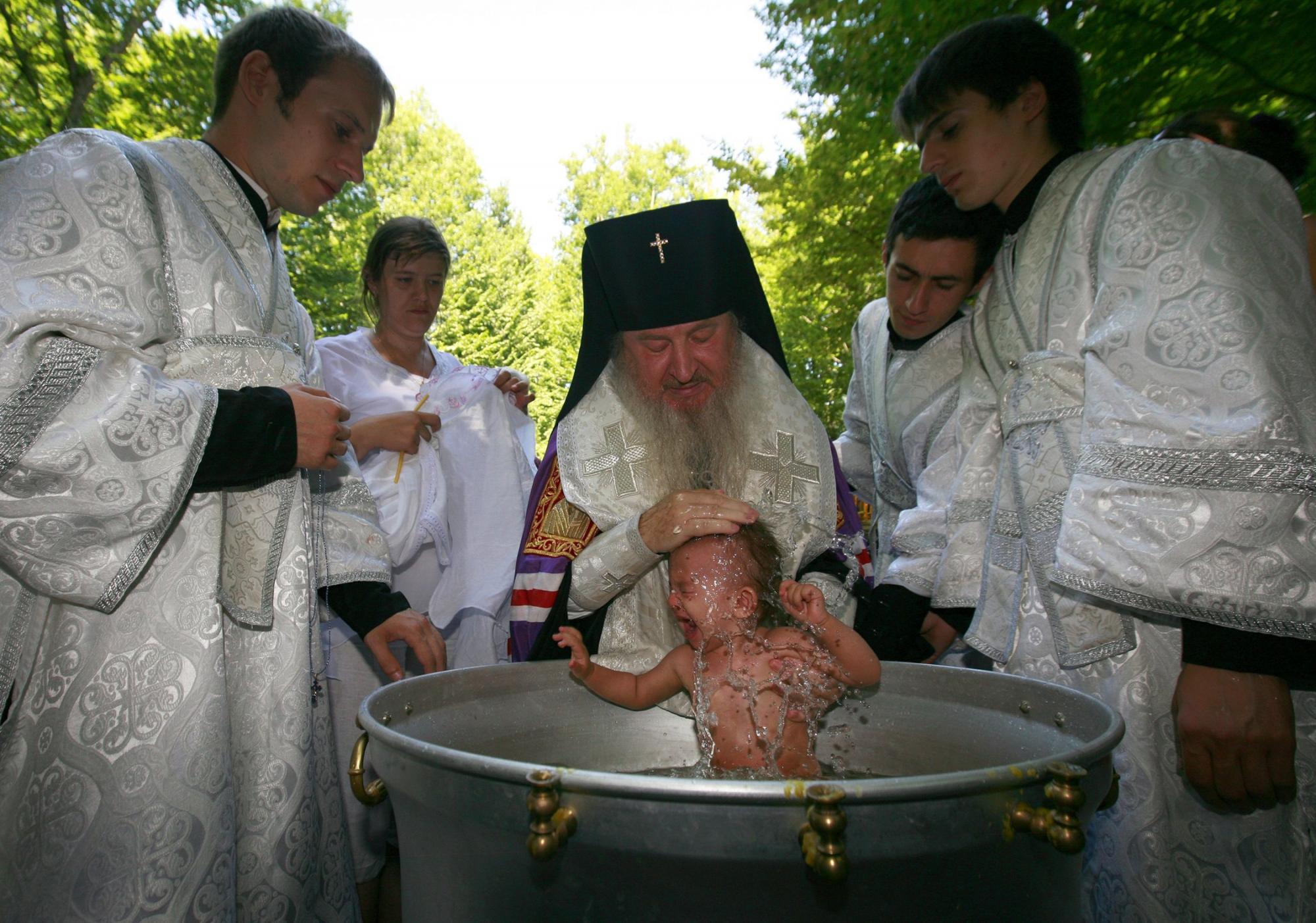 Baptizing to mark Christianity conversion