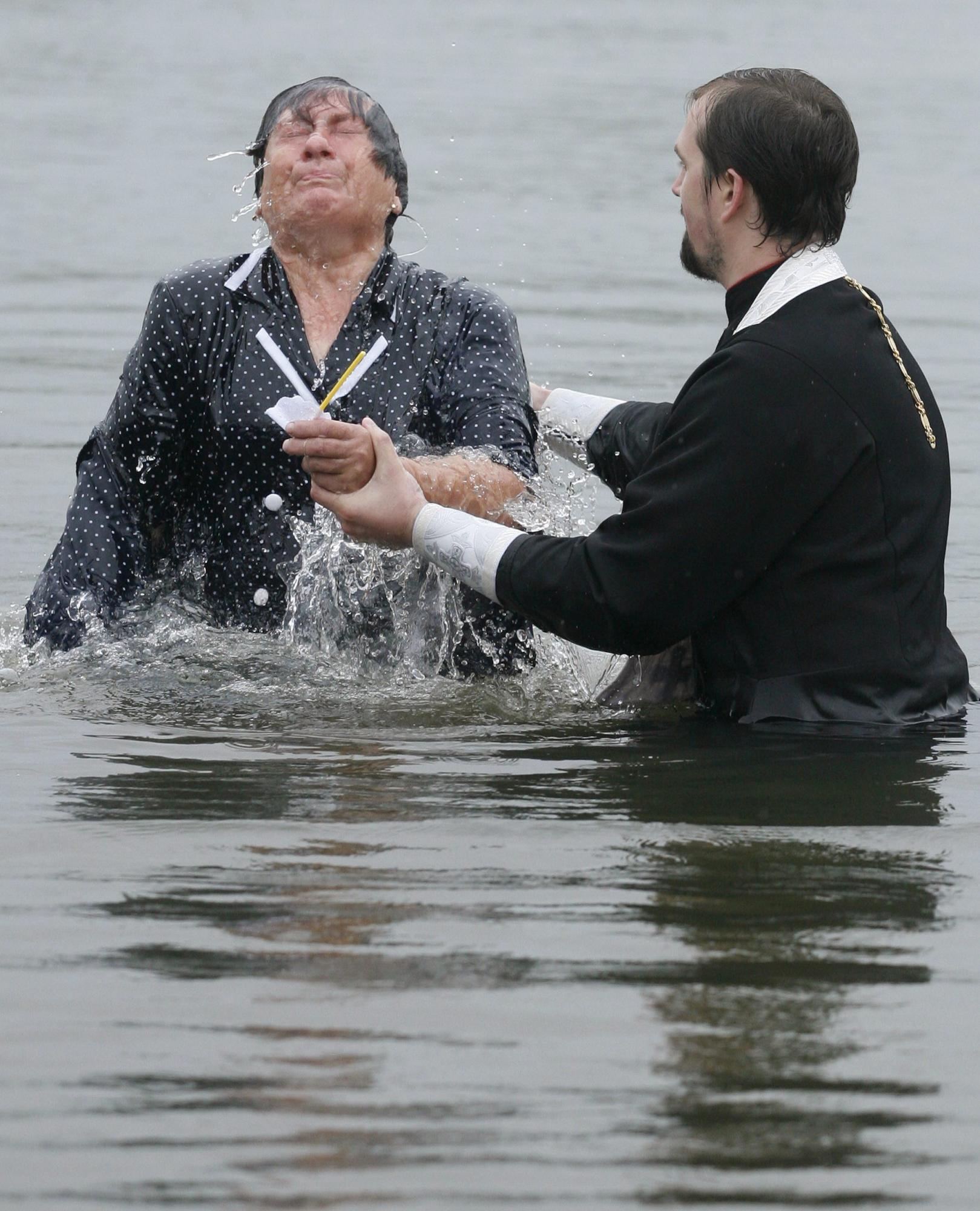 Baptizing to mark Christianity conversion
