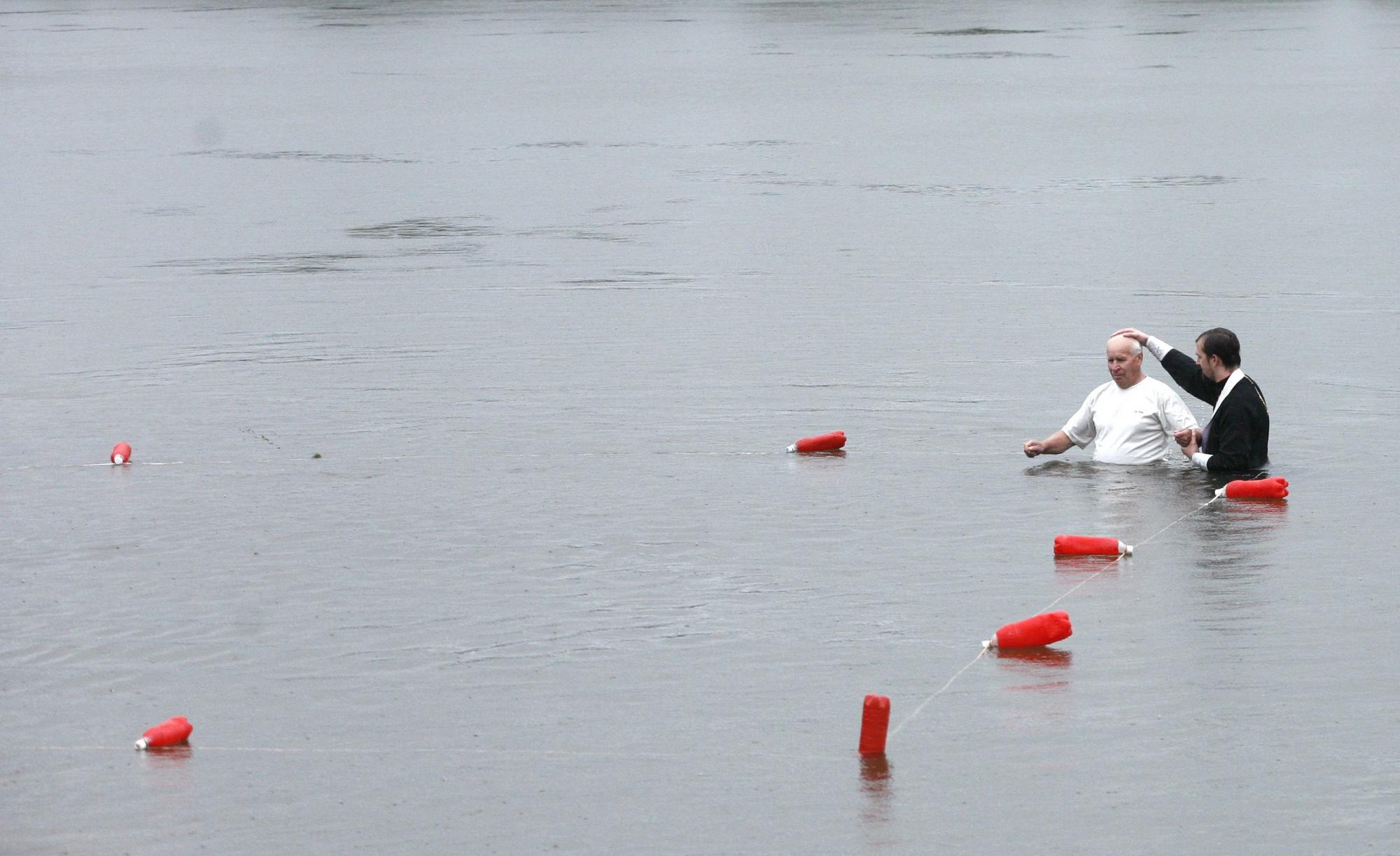 Baptizing to mark Christianity conversion