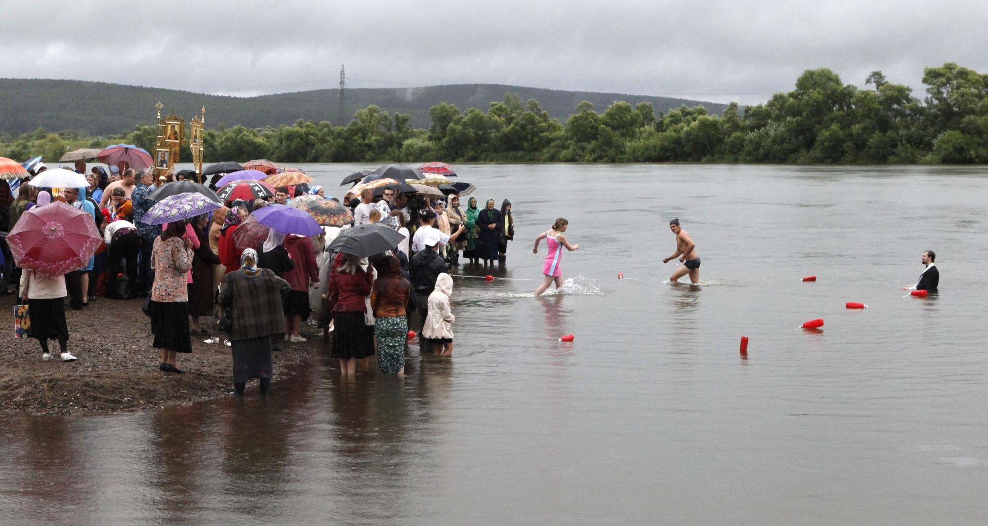 Baptizing to mark Christianity conversion