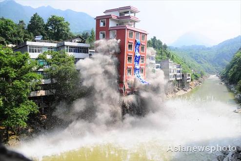 Illegal buildings demolished by blast