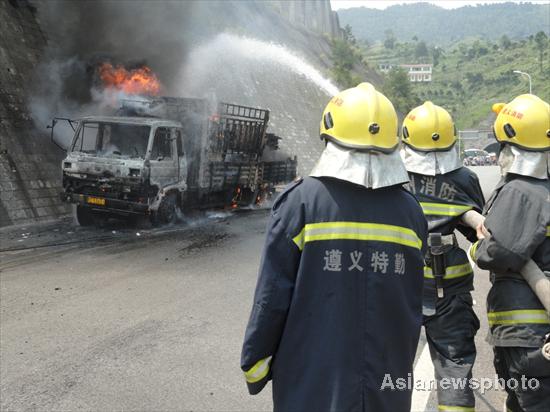 Fire engulfs truck in SW China