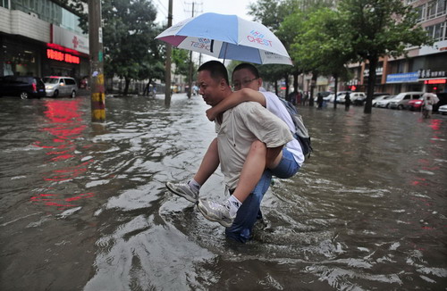Floods overwhelm streets in NE China
