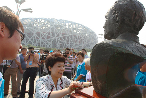 China marks Beijing Olympics 2 years later