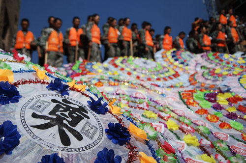 Zhouqu in mourning for mudslide victims