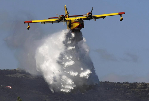 Spain, Portugal fight 19 large wildfires