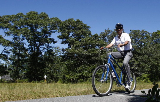 First family goes on island vacation bike outing