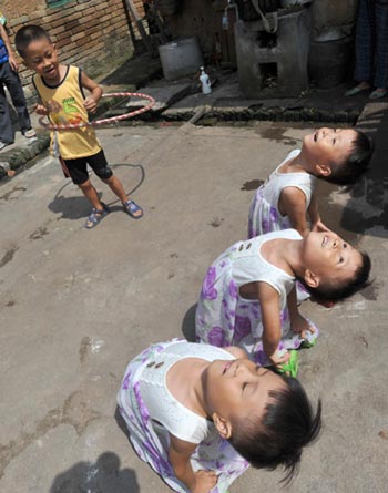 Quadruplets ready for school