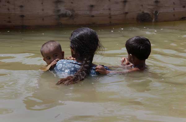 Life among flood waters and ruins