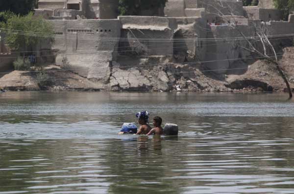 Life among flood waters and ruins