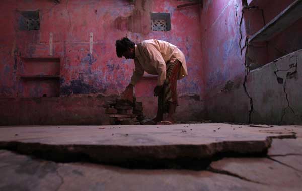 Life among flood waters and ruins