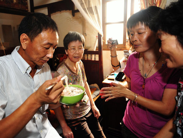 Chinese trawler captain back home