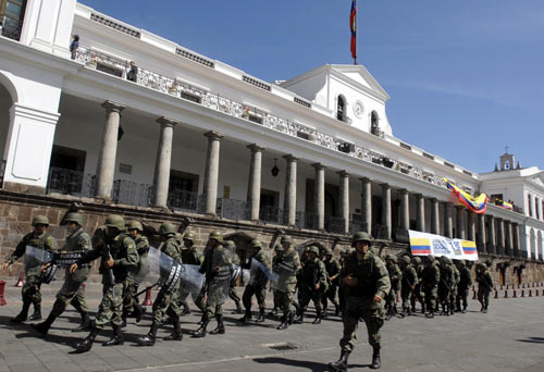 Ecuador's Correa asserts control, police chief quits