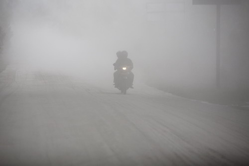 Indonesians choke up as volcano erupts again