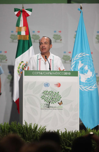 Cancun climate talks continue with protests