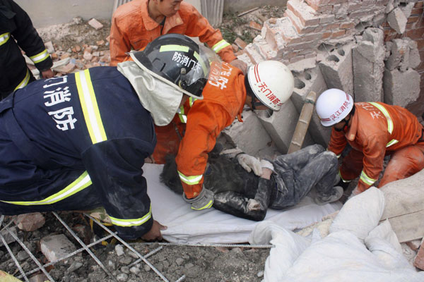 All nine trapped in building collapse rescued