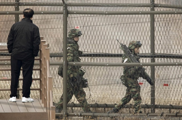 ROK soldiers patrol along border