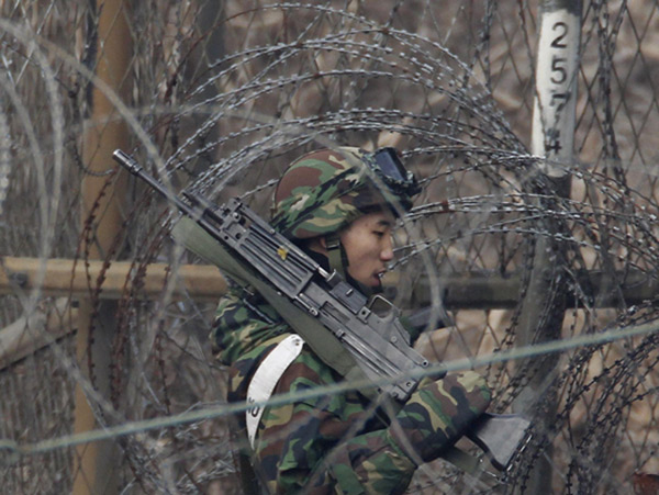 ROK soldiers patrol along border