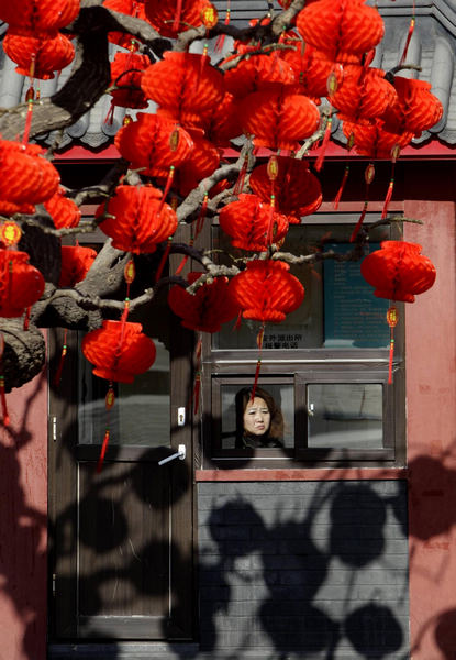 Trees decorated in red to greet Chinese New Year