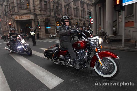 US ambassador bids farewell on a Harley