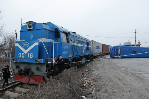 Two severely hurt after bus-train crash