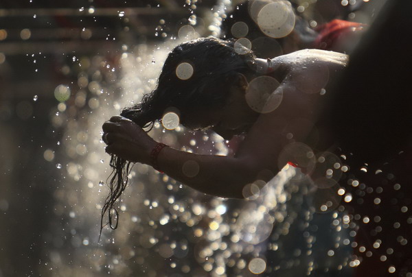 Washing away bad health on Balaju