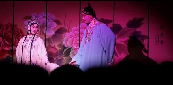 An actress and an actor from China's Shanghai Kunju Opera Company perform the Kunqu opera 'The Peony Pavilion' during the Shanghai Culture Month in Paris, capital of France, April 18, 2011. Kunqu opera staged in Paris