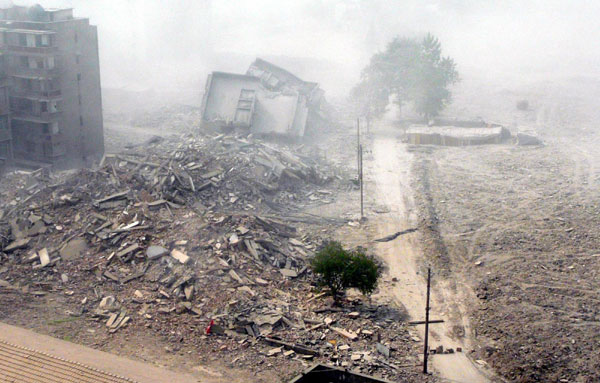 Old buildings demolished by directional blasting