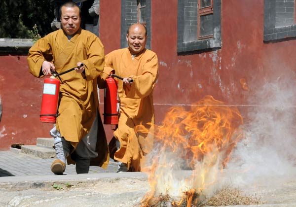 Monks in Mount Tai learn fire-control