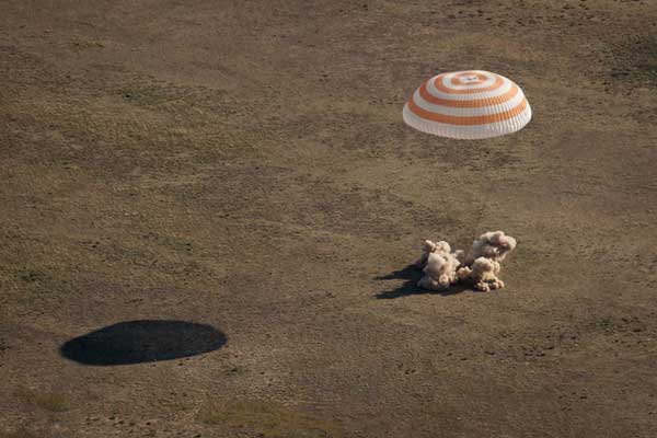 The Soyuz TMA-20 spacecraft is seen as it lands with the ISS crew of NASA astronaut Catherine Coleman, Russian cosmonaut Dmitry Kondratyev and European Space Agency Astronaut Paolo Nespoli in a remote area southeast of the town of Zhezkazgan, Kazakhstan, May 24, 2011.[ ISS astronauts lands safely in Kazakhstan
