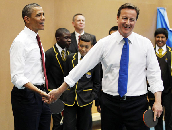 Obama, Cameron team up as table tennis partners