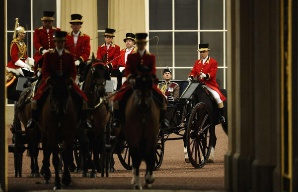 Britain's Prince Edward sits in a horse drawn carriage as he makes his way from Buckingham Palace to attend the Trooping the Colour ceremony in central London June 11, 2011. Britain marks Queen's birthday