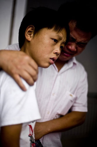 Family lost to landslide, boy is left with dog