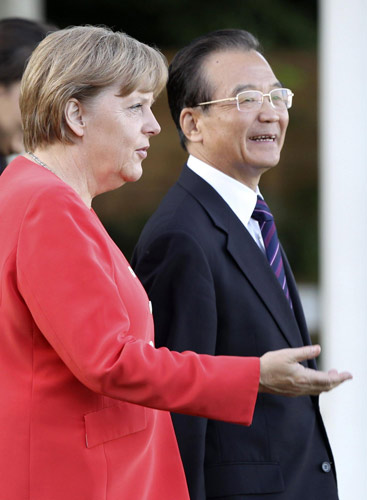 Premier Wen arrives in Germany, meets Merkel
