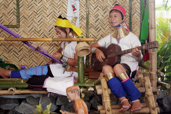 Myanmar women show off copper neckwear