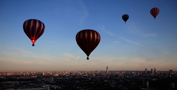 Hot air balloons rise over London