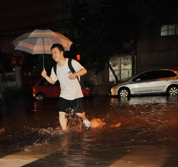 Beijing drenched in downpour