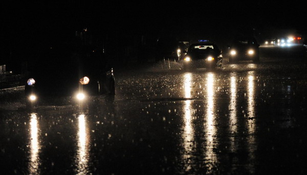 Beijing drenched in downpour